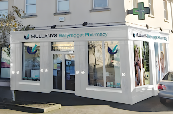 Mullanys Ballyragget Mullany's Ballyragget Pharmacy exterior with signage and green cross.